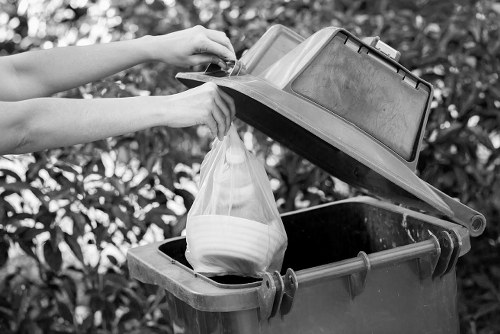 Professional waste removal team at work in Millbank